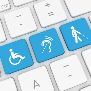 keyboard keys with three blue keys, icon of wheelchair, icon of hearing ear, icon of blind man walking